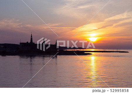 Kronborg castle silhouette in Helsingor at sunset Kronborg castle silhouette in Helsingor at sunset 52995858