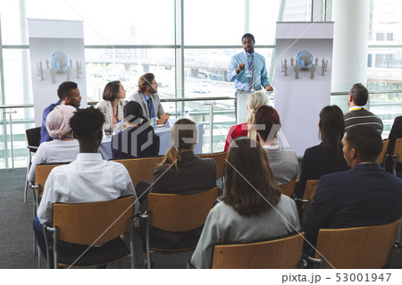 Male speaker speaks in a business seminar Male speaker speaks in a business seminar 53001947