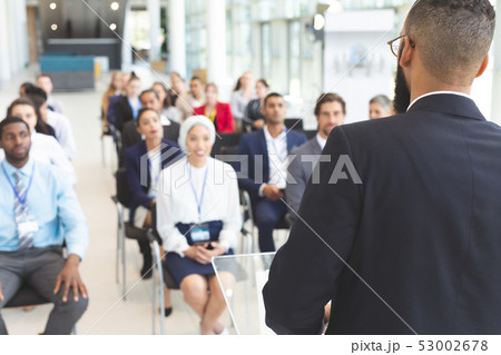 Male speaker speaks in a business seminar Male speaker speaks in a business seminar 53002678