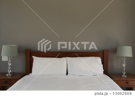 Table lamp in bedroom at home Table lamp in bedroom at home 53002809