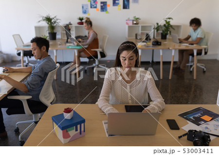 Business people working in office Business people working in office 53003411