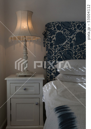 Table lamp in bedroom at home 53004112