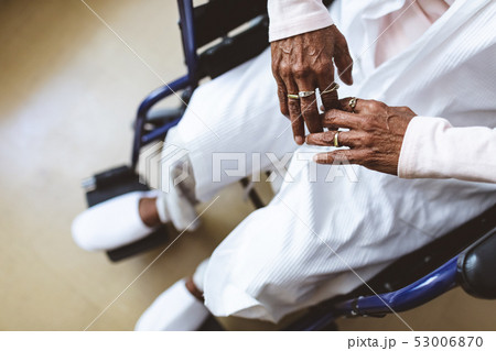 Senior woman sitting on wheelchair at nursing home 53006870