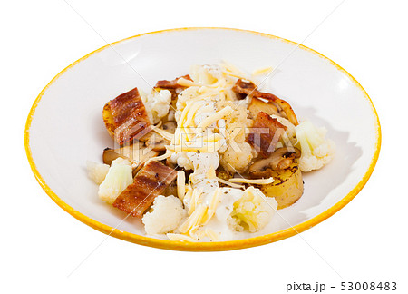 Baked potatoes with cauliflower, bacon, cheese sauce 53008483