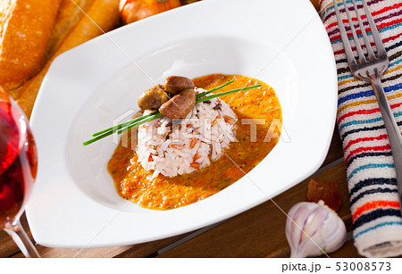 Chicken hearts with rice, tomato cream sauce, rose wine 53008573