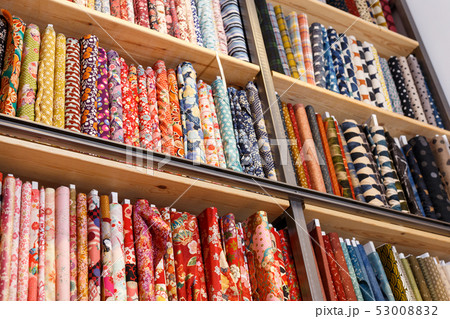 Cloth rolls on store shelves 53008832
