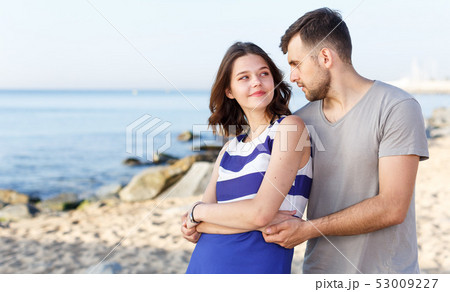 Happy loving couple standing and hugging 53009227