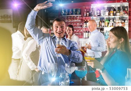 Drunken man having fun at party 53009753