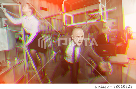 Tensed businessman running 53010225