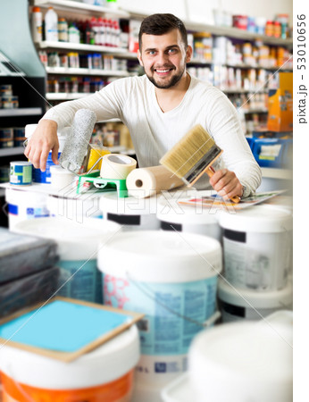 Male customer purchasing tools for house improvements 53010656