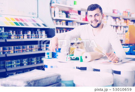 Male customer purchasing tools for house improvements Male customer purchasing tools for house improvements 53010659