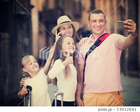 Travelers family taking selfie 53012691
