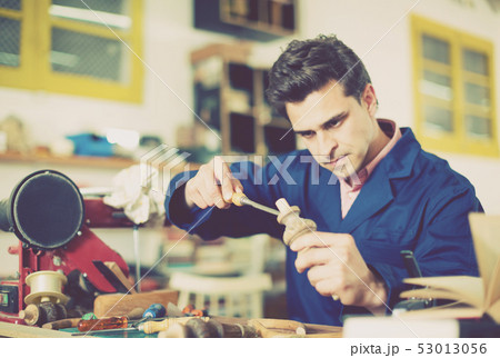 Carpenter working in studio 53013056