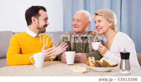 Family enjoying evening 53013306