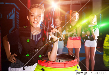 Boy with laser gun on lasertag arena 53015572