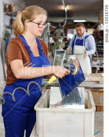 Woman washing glass after cutting 53016706