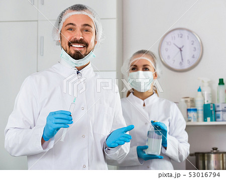 Woman nurse and man doctor ready to work in office 53016794