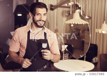professional man hairdresser in salon 53017360