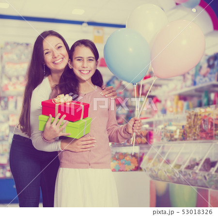 Happy people in toys store Happy people in toys store 53018326