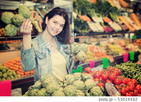 Woman choosing fruit 53019382