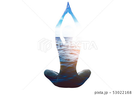 double exposure women doing yoga and sea. 53022168