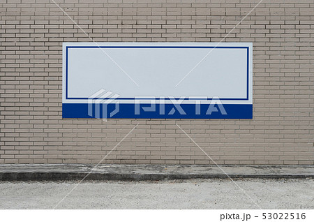 Large blank billboard on a street wall, banners 53022516
