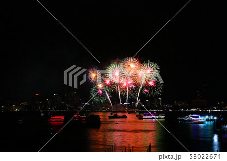 color fireworks on beach and reflection color on 53022674