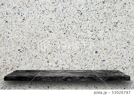 Empty top of black marble stone shelves on 53026787