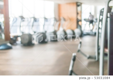 Gym blur background fitness center workout studio 53031084