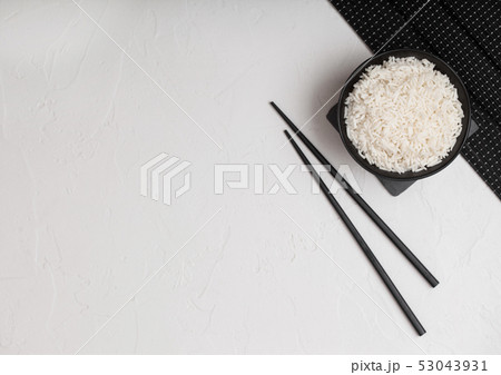 White bowl with boiled organic basmati jasmine White bowl with boiled organic basmati jasmine 53043931