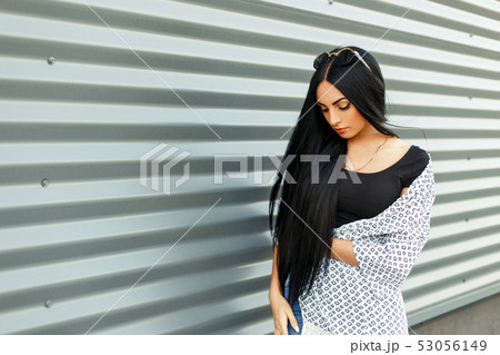 Beautiful brunette with long hair Beautiful brunette with long hair 53056149