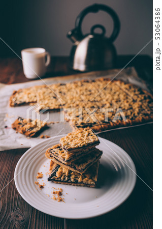 Plate of freshly baked homemade cookies with jam 53064386
