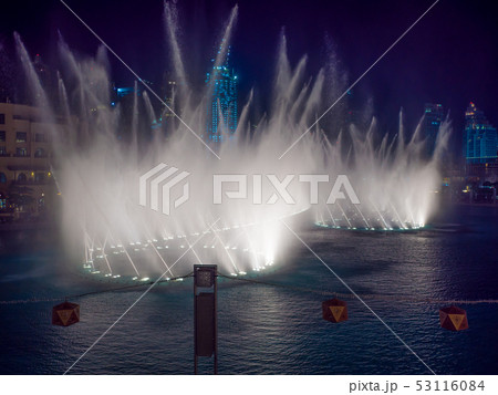 Dancing fountain with lighting in the city at night. 53116084