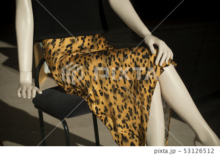 closeup of yellow and black leopard printed skirt 53126512