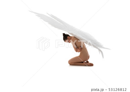 Nude angel with white wings embracing body 53126812