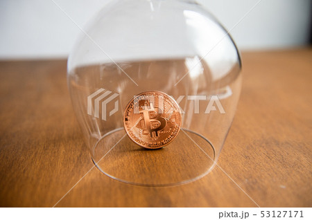 Bitcoin covered by a glass Bitcoin covered by a glass 53127171