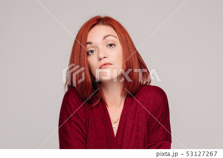 Business woman wearing in red having passive 53127267