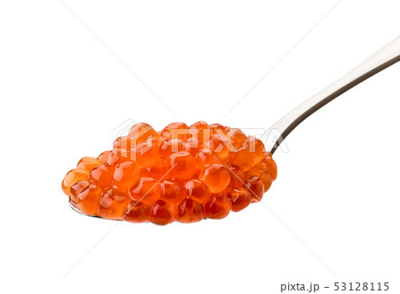 Spoon of salted salmon caviar carved on a white Spoon of salted salmon caviar carved on a white 53128115