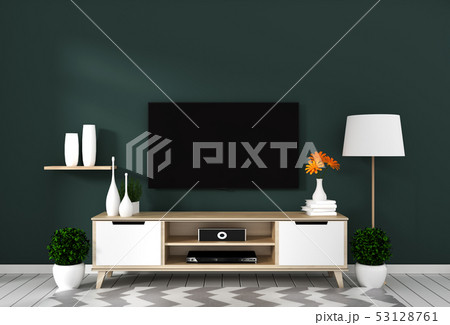 Smart Tv with blank screen hanging on dark wall 53128761