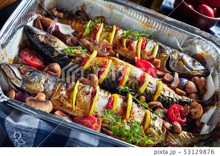 close-up of hot three whole broiled mackerels 53129876