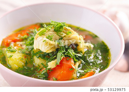 Tasty soup with chicken and vegetables. closeup 53129975