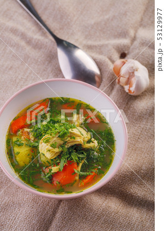 Tasty soup with chicken and vegetables. closeup 53129977