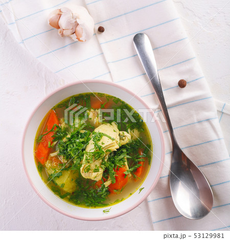 Tasty soup with chicken and vegetables. closeup 53129981