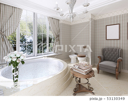 Large round bath in the bathroom in a classic 53130349