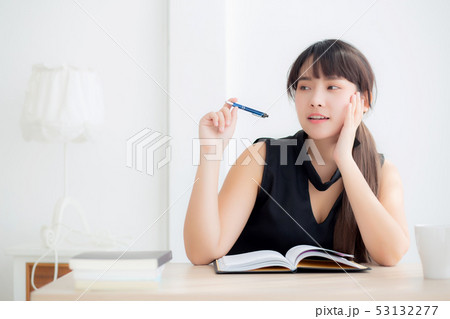 Beautiful asian woman thinking idea writing book Beautiful asian woman thinking idea writing book 53132277