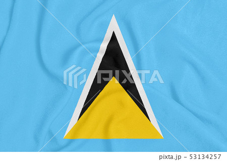 Flag of Saint Lucia on textured fabric. Patriotic 53134257