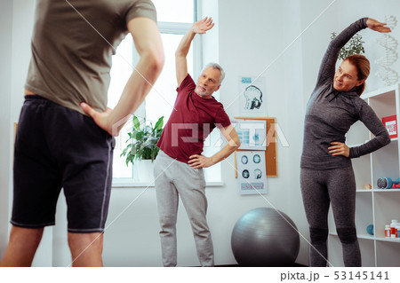Nice active people having a workout together Nice active people having a workout together 53145141