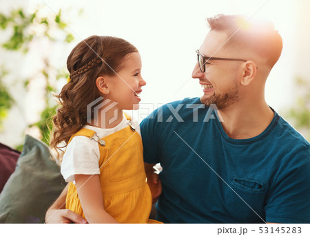 Father's day. Happy family daughter hugs his dad  53145283