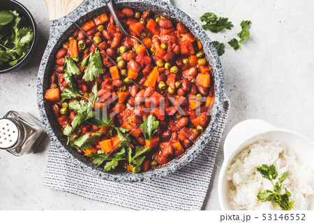 Vegan bean stew with tomatoes in a pan Vegan bean stew with tomatoes in a pan 53146552