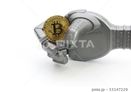The robot holds one gold coin - bitcoin. The robot holds one gold coin - bitcoin. 53147229